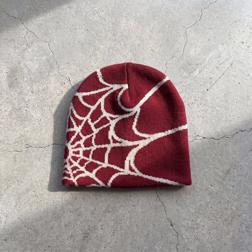 Gorro de punto con diseño de telaraña